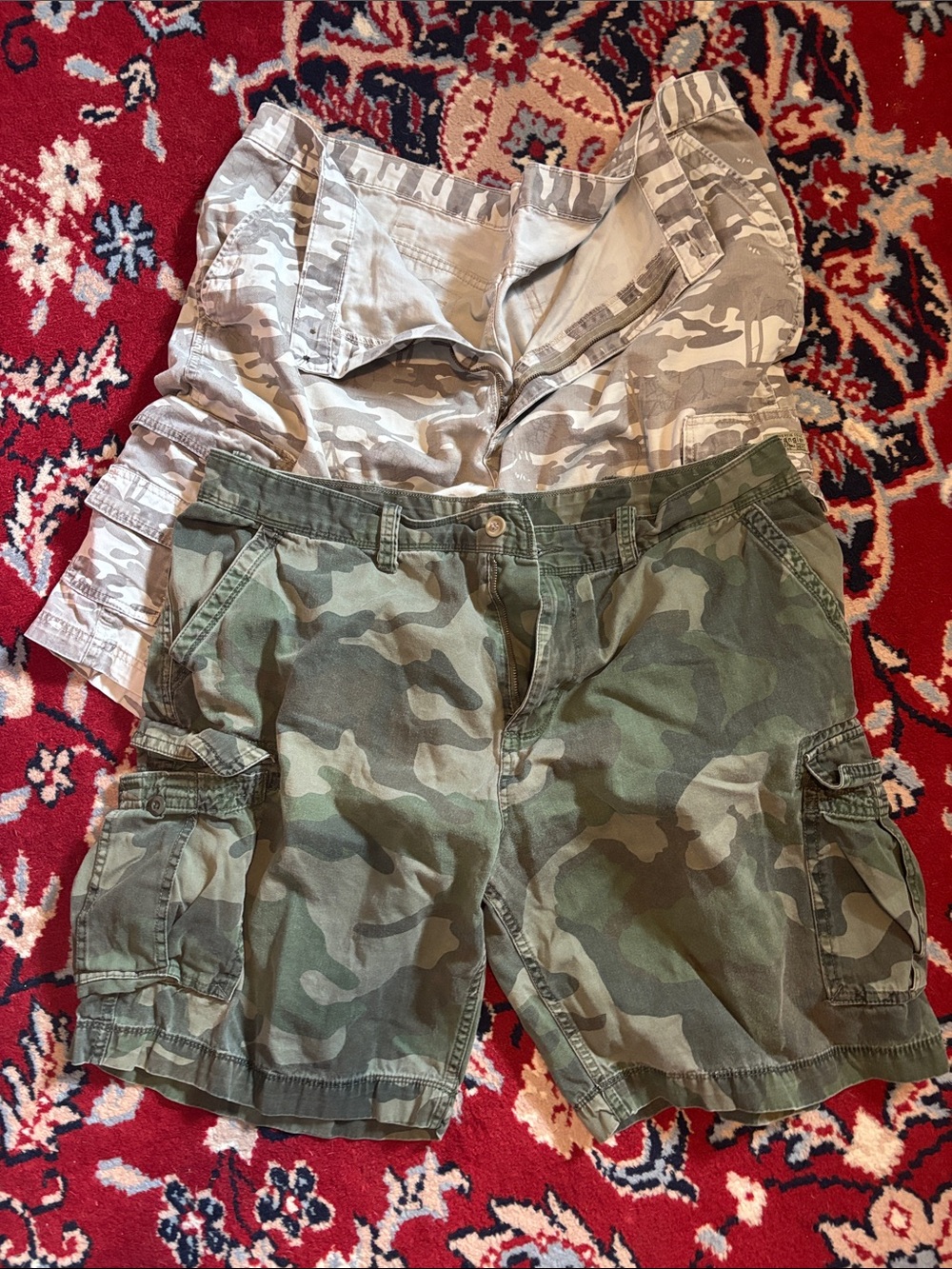 Two Pairs of Camo Cargo Shorts. One Green and One Brown. Both Size 44W